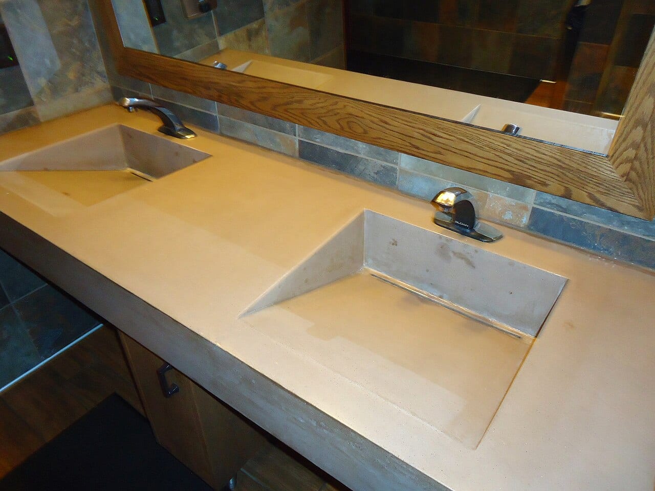 Paired bathroom basins with chrome faucets